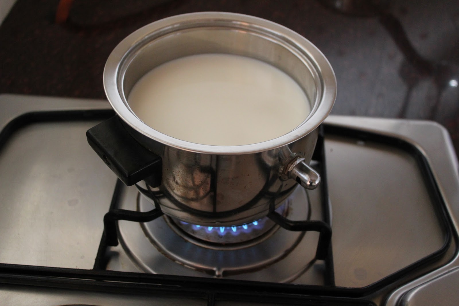 Image result for karaja pujan bathing boiled milk of baby pic