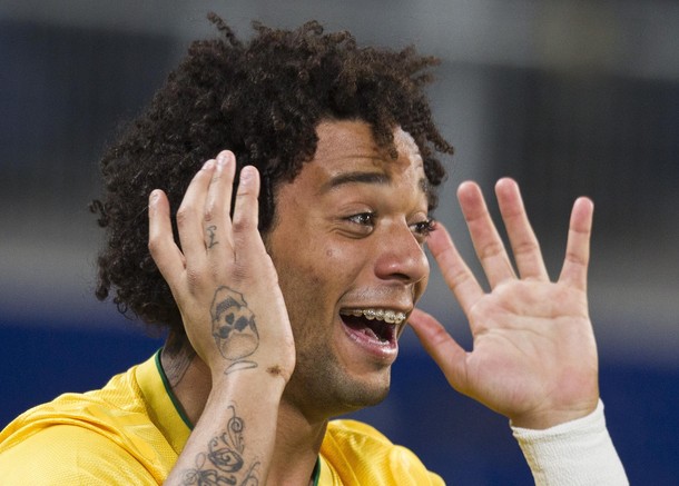 Brazil's Marcelo celebrates after scoring during their friendly soccer match against Bosnia in St. Gallen