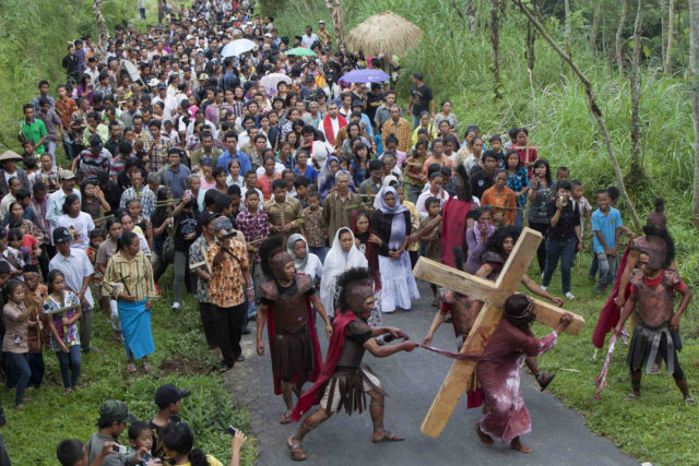 Vilagers take part in an Easter Passion Play re-enacting the crucifixion of Jesus Christ on Good Friday at Gantang Village near Magelang, in the province of Central Java