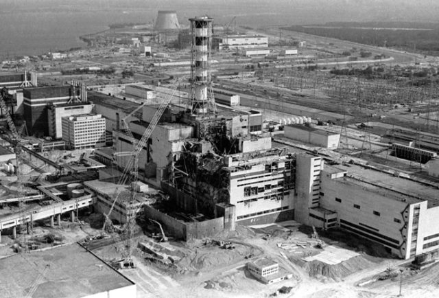 View of the Chernobyl nuclear power plant's fourth reactor in this May 1986 file photo. Engineers at Chernobyl nuclear power station shut down its last working reactor a day earlier than planned Thursday, in an impromptu attempt to impress visiting Ukrainian President Leonid Kuchma. But officials said the plant, site of the world's worst nuclear disaster in 1986, would be restarted, so as not to spoil a televised button-pushing ceremony planned for Friday when the power station is finally put to rest. Chernobyl's Number Four reactor caught fire and exploded in April 1986, sending a radioactive cloud of dust over Ukraine, Belarus, Russia and other parts of Europe.(B&W ONLY) REUTERS/Vladimir Repik  VR/VB - RTRHD1P