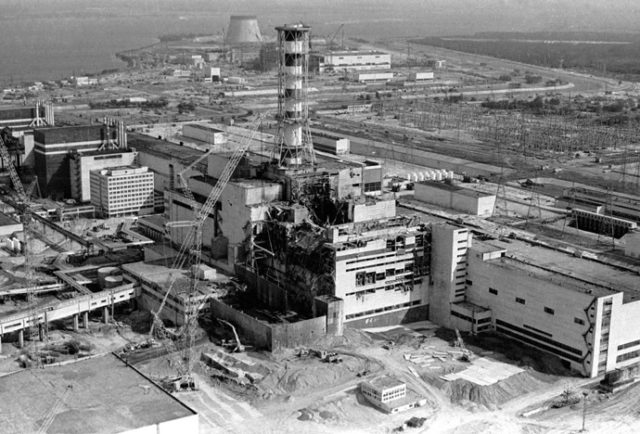 View of the Chernobyl nuclear power plant's fourth reactor in this May 1986 file photo. Engineers at Chernobyl nuclear power station shut down its last working reactor a day earlier than planned Thursday, in an impromptu attempt to impress visiting Ukrainian President Leonid Kuchma. But officials said the plant, site of the world's worst nuclear disaster in 1986, would be restarted, so as not to spoil a televised button-pushing ceremony planned for Friday when the power station is finally put to rest. Chernobyl's Number Four reactor caught fire and exploded in April 1986, sending a radioactive cloud of dust over Ukraine, Belarus, Russia and other parts of Europe.(B&W ONLY) REUTERS/Vladimir Repik  VR/VB - RTRHD1P